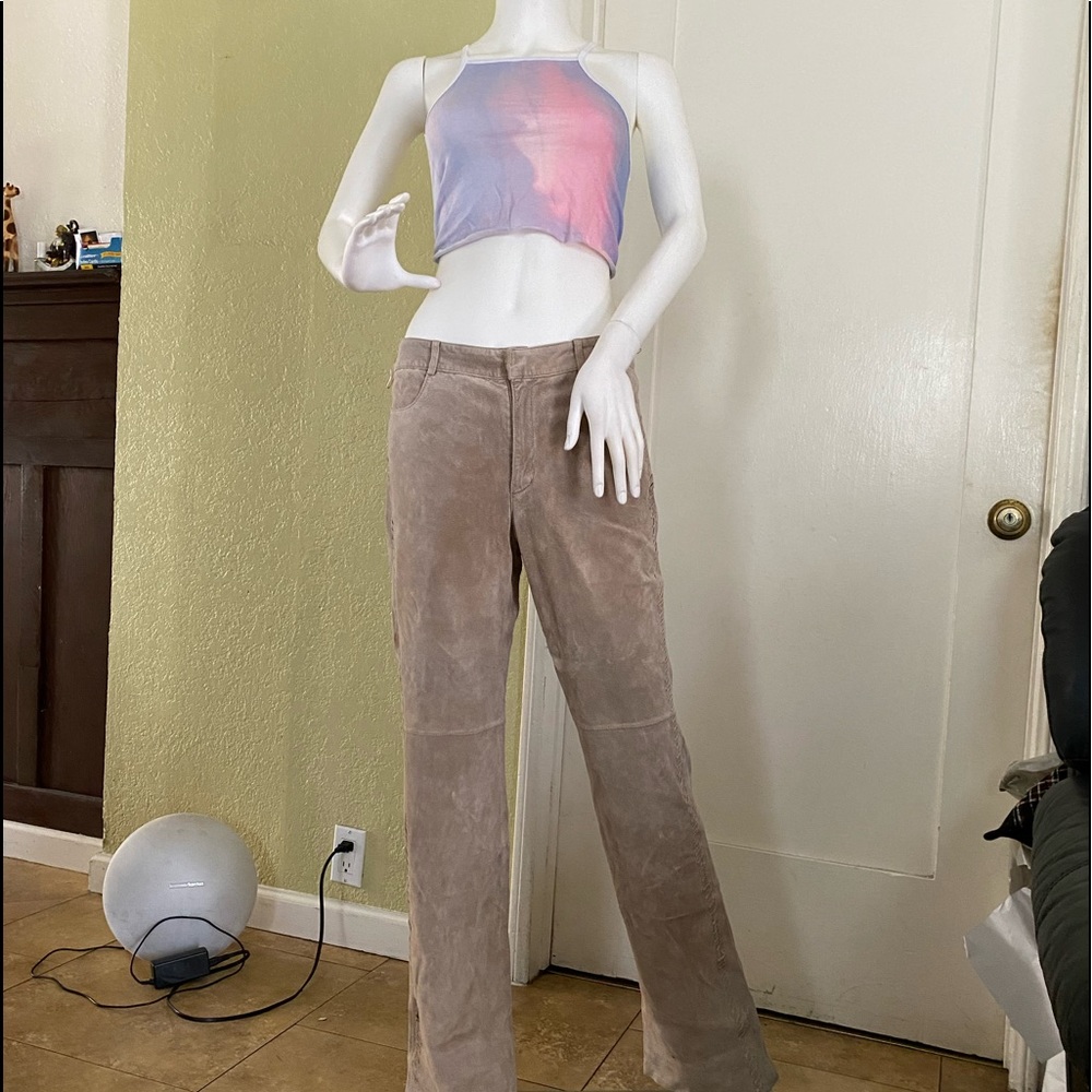 Vintage suede pants size 8 it has a small like oil stains.  Brand New frontier